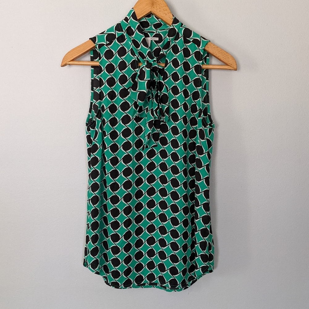 Halogen sleeveless top